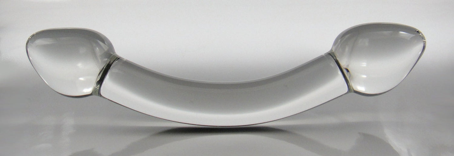 Pequeño consolador de cristal con forma de arco y dos cabezas